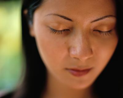 woman embarrassed of drooling needs affordable dental treatment